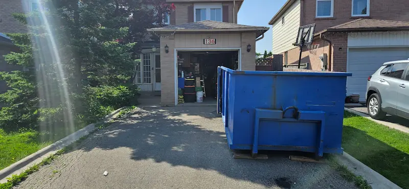 20 yard bin placed on residential driveway