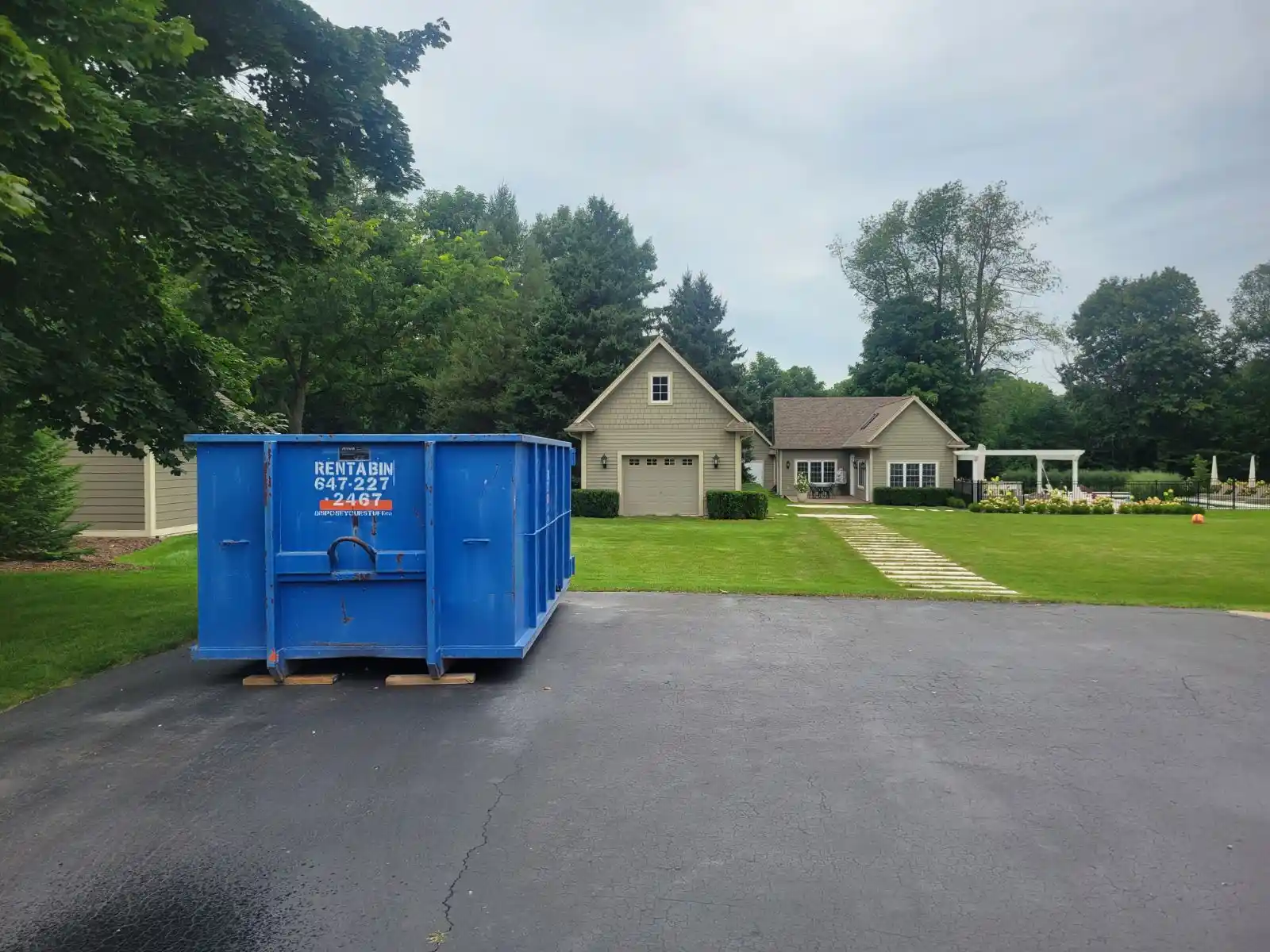Dumpster positioned on private driveway in Vaughan