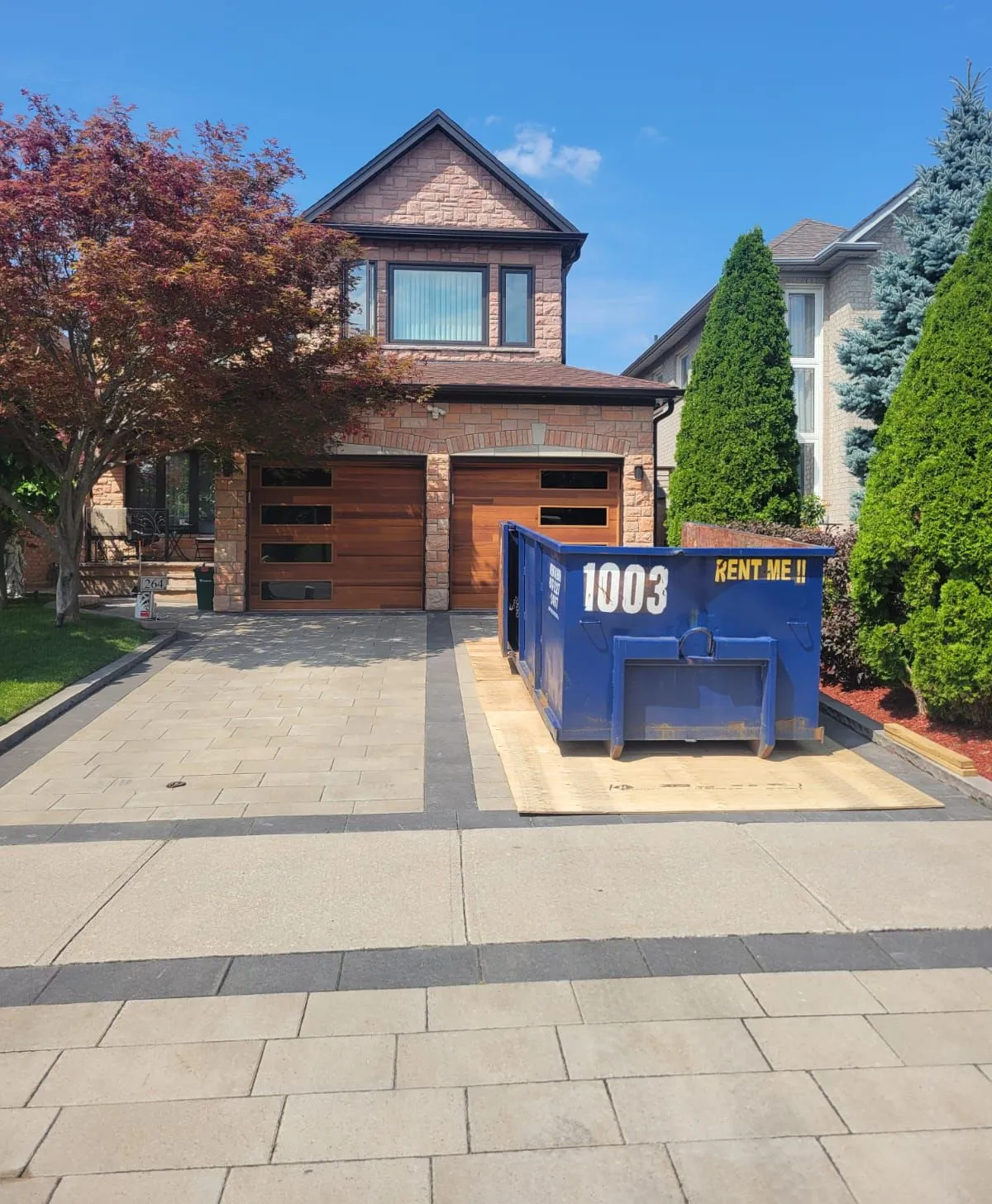 Rental bin on protective wood boards